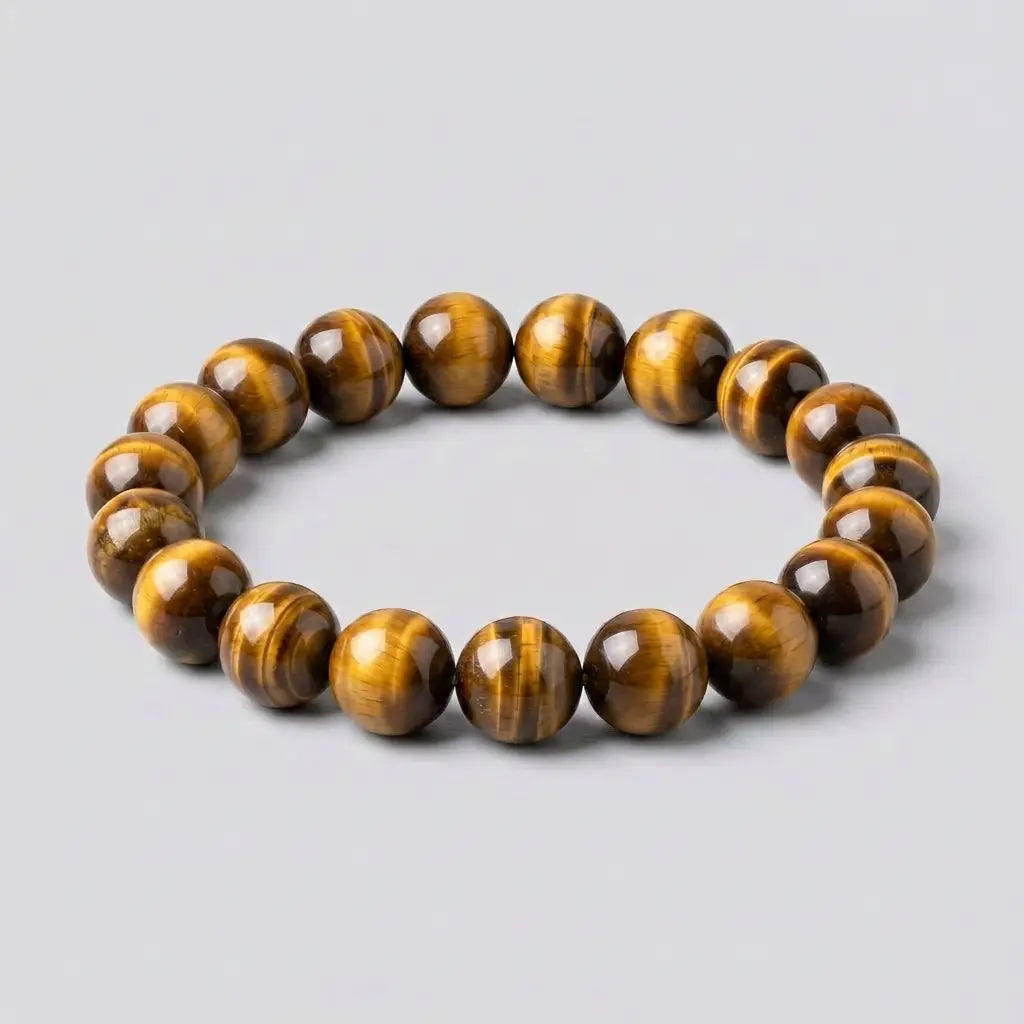 Bracelet homme en pierre naturelle œil de tigre Kynstone avec perles premium marron et dorées.